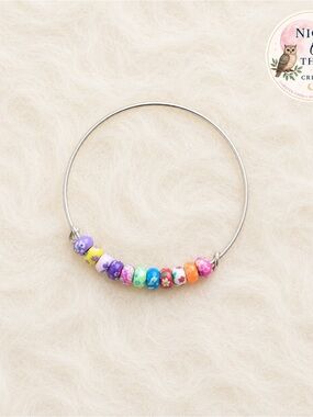 Multi-colored handcrafted bangle bracelet with feminine flower designs ~ NEW